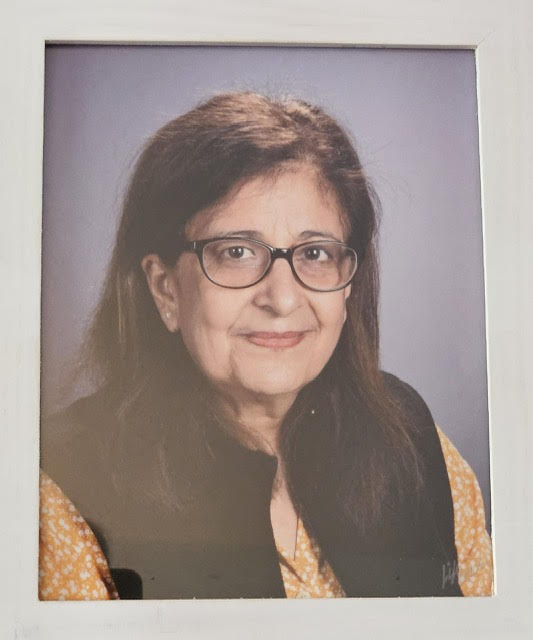 Ms. Yasmeen smiling